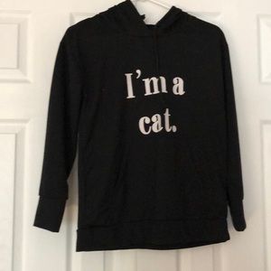 Black hoodie, cat ears on hood